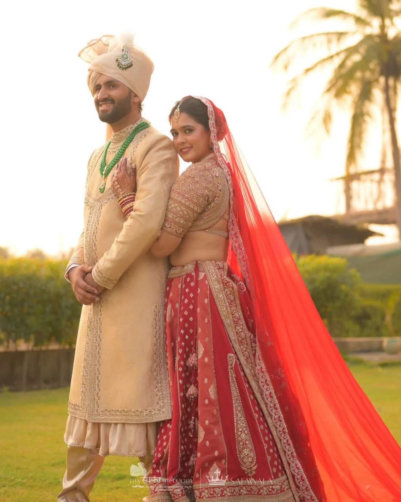 Classic groom pagdi styled with a red ceremonial stole