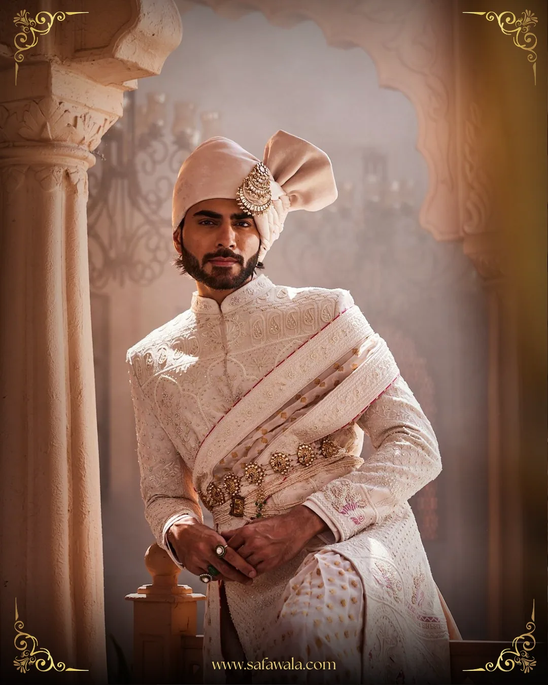 Groom wearing a refined ivory wedding safa and embroidered sherwani